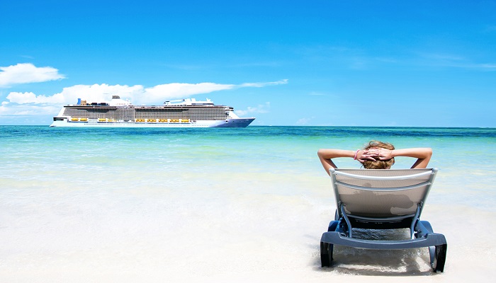 Cruise vacation concept. Cruise ship in the sea near the tropica